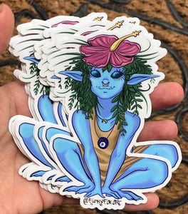 A hand holding a stack of blue elf-nymph FunkyFae art stickers.