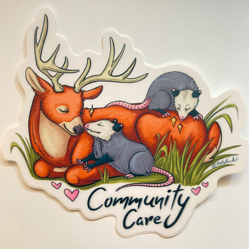 Art sticker of a deer laying down with its legs tucked in some grass with two grey opossums licking the deer clean preventing ticks, one on its back and the other is licking the deers nose. The words “Community Care” are written in script underneath 